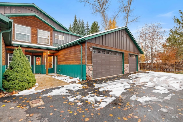 view of front of property with a garage