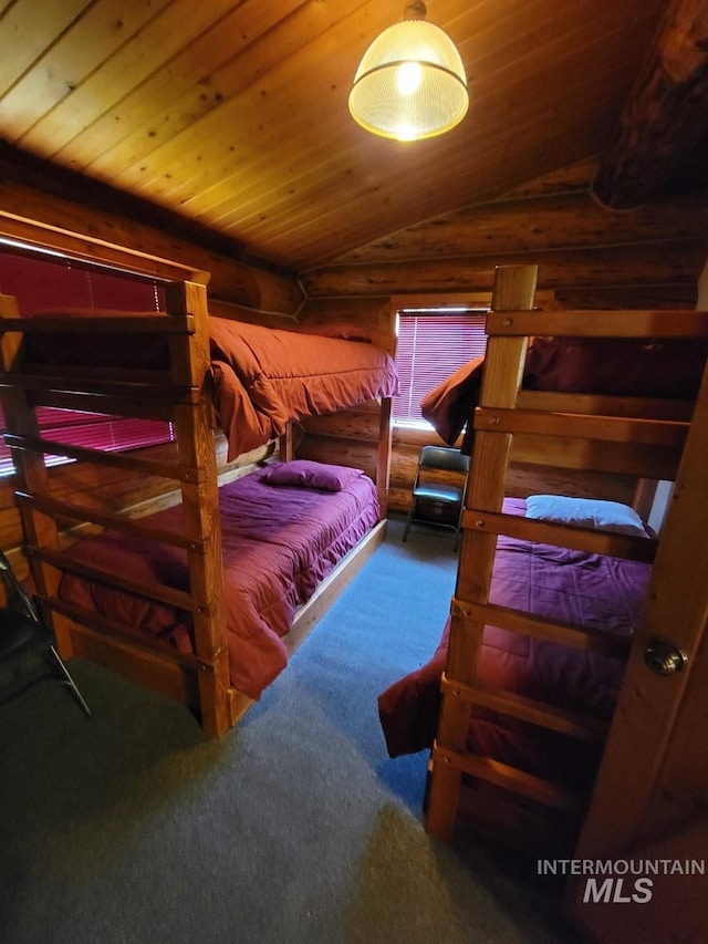 bedroom with log walls, carpet flooring, wooden ceiling, and lofted ceiling