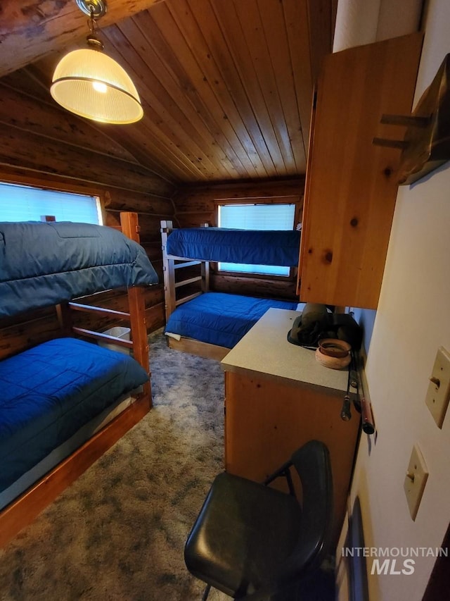 bedroom with wood ceiling, lofted ceiling, and hardwood / wood-style floors