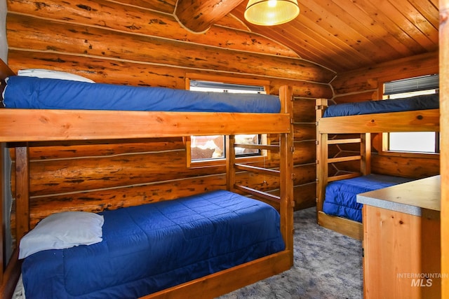 bedroom featuring log walls, vaulted ceiling, dark colored carpet, and wood ceiling