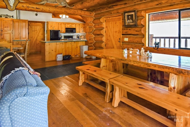 living room with dark hardwood / wood-style floors, log walls, and lofted ceiling with beams