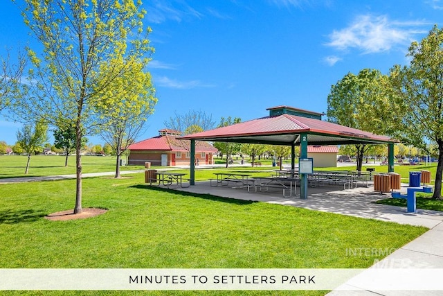 surrounding community featuring a gazebo and a yard