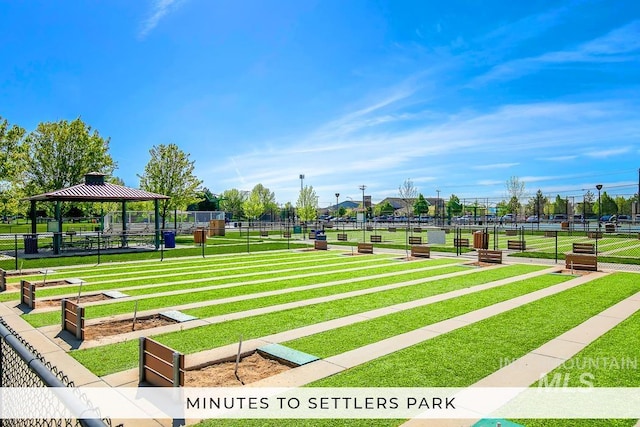 view of community featuring a gazebo and a lawn