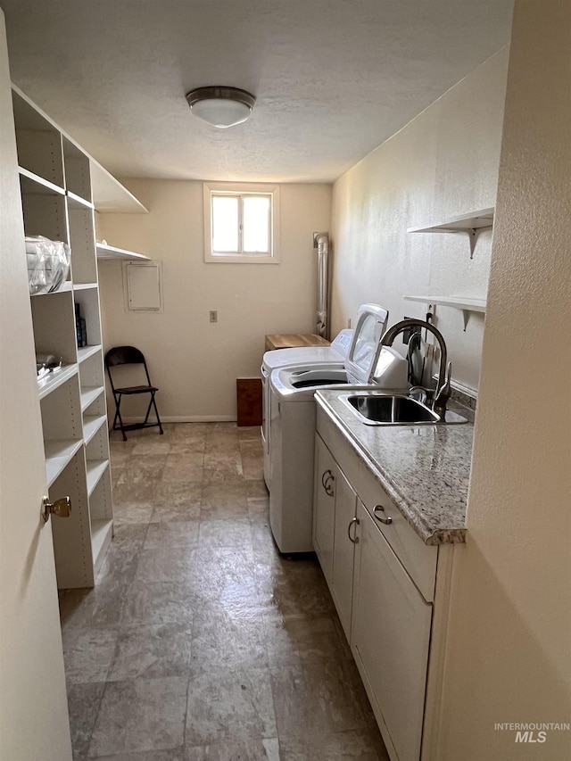 1315 W Howard, Boise, ID 83706 - laundry room featuring washing machine and clothes dryer, cabinet space, and baseboards