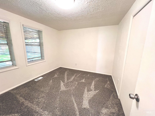 1315 W Howard, Boise, ID 83706 - carpeted empty room featuring a textured ceiling and baseboards