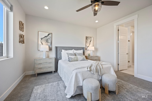 carpeted bedroom featuring ceiling fan