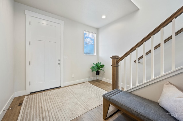 foyer entrance with wood-type flooring