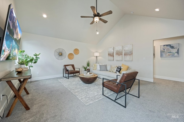 living room featuring ceiling fan and high vaulted ceiling