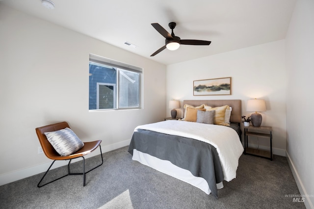 bedroom with dark carpet and ceiling fan