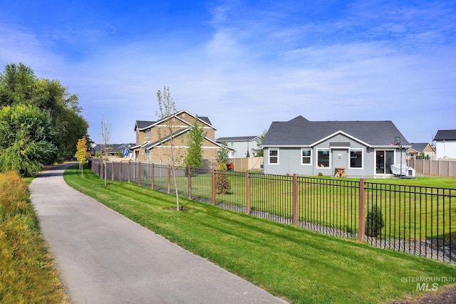 20138 Carbondale Ave, Caldwell, ID 83605 - exterior space featuring a residential view, a lawn, and fence