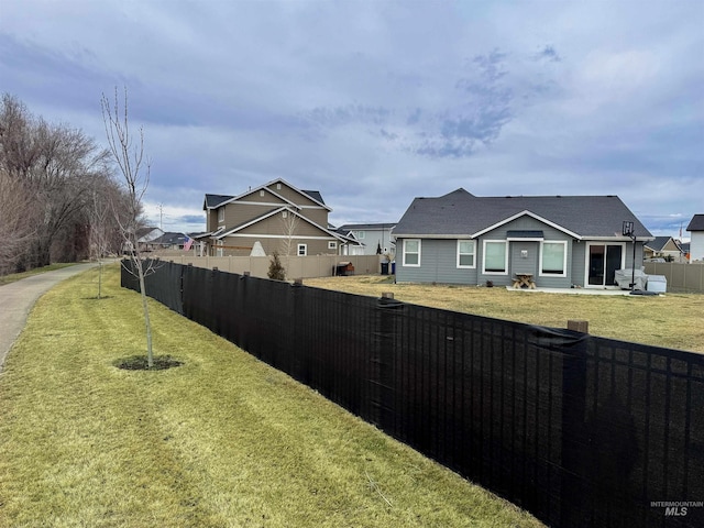 20138 Carbondale Ave, Caldwell, ID 83605 - view of yard featuring a residential view and a fenced backyard