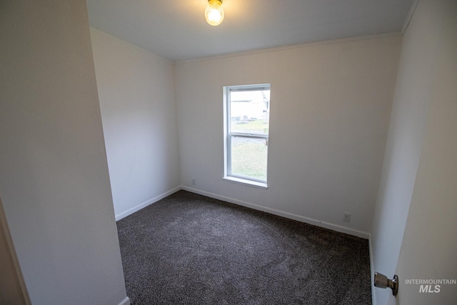 carpeted empty room with ornamental molding