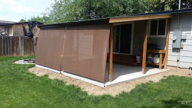 view of outdoor structure with a lawn