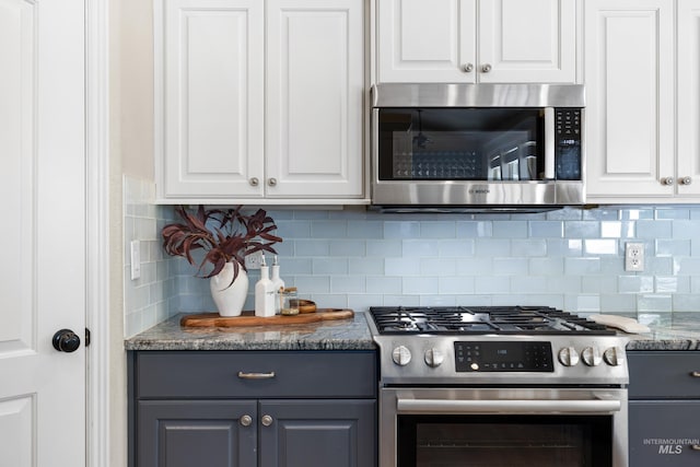 12258 Whitechapel Way, Nampa, ID 83686 - kitchen featuring stainless steel appliances, gray cabinetry, white cabinets, and backsplash