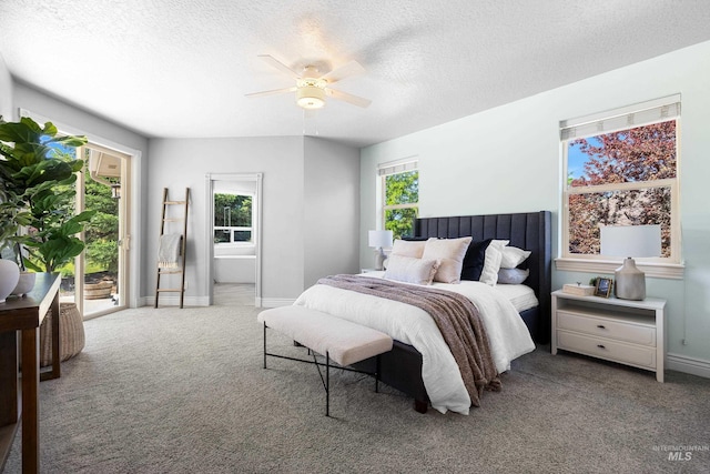 12258 Whitechapel Way, Nampa, ID 83686 - carpeted bedroom with access to outside, baseboards, a textured ceiling, and ceiling fan