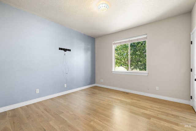 12258 Whitechapel Way, Nampa, ID 83686 - unfurnished room with light wood-style floors and baseboards