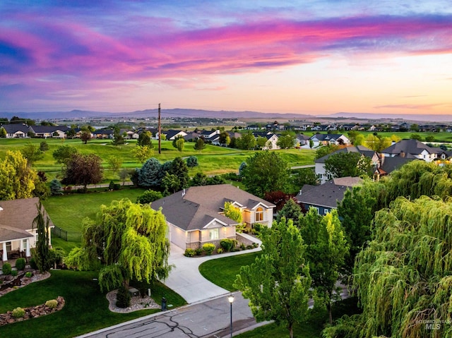12258 Whitechapel Way, Nampa, ID 83686 - aerial view at dusk of a residential view and a mountain view
