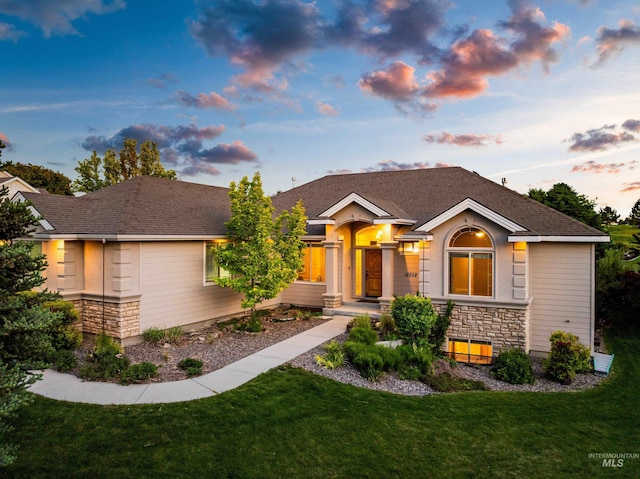 12258 Whitechapel Way, Nampa, ID 83686 - ranch-style home featuring stone siding and a front yard