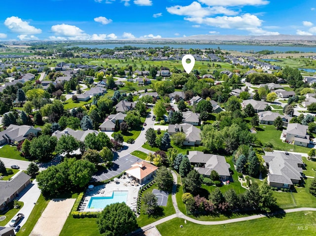 12258 Whitechapel Way, Nampa, ID 83686 - aerial view of residential area with a nearby body of water and a pool
