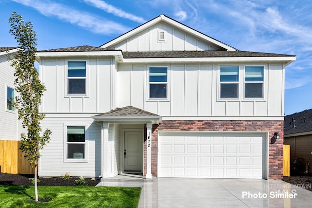 view of front of property with a garage