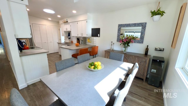 2927 N 32nd St, Boise, ID 83703 - dining room featuring dark wood-style flooring and recessed lighting