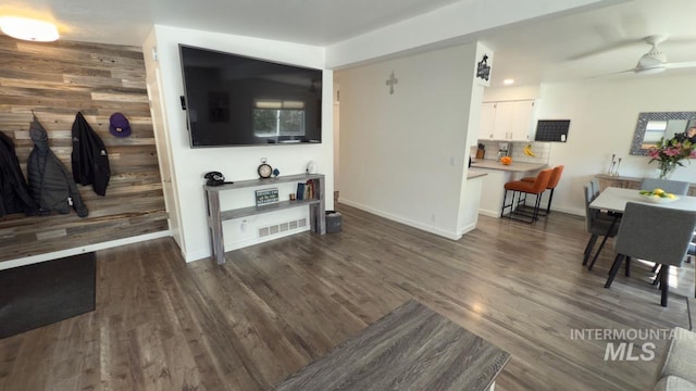2927 N 32nd St, Boise, ID 83703 - living area featuring baseboards, visible vents, wood finished floors, and a ceiling fan