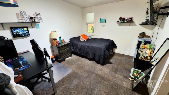 2927 N 32nd St, Boise, ID 83703 - carpeted bedroom featuring baseboards