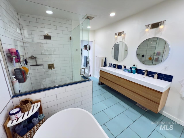 2927 N 32nd St, Boise, ID 83703 - full bath with a soaking tub, visible vents, recessed lighting, tile patterned flooring, and tiled shower