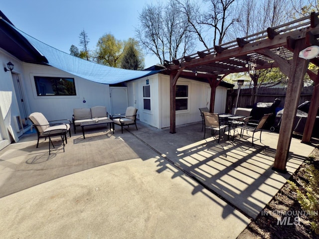 2927 N 32nd St, Boise, ID 83703 - view of patio with a pergola, outdoor dining space, an outdoor hangout area, and fence