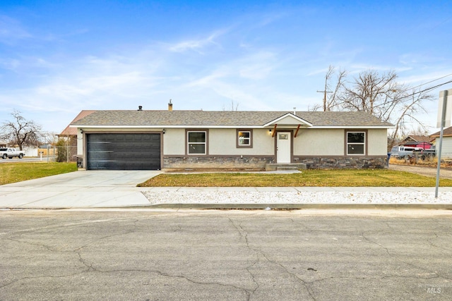 single story home featuring a garage