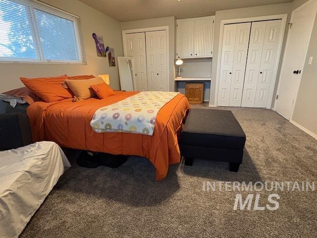 11457 S Cloverdale, Kuna, ID 83634 - carpeted bedroom with baseboards and multiple closets