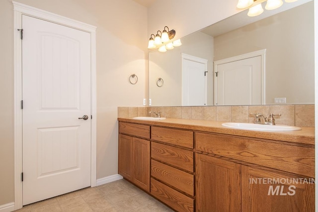 325 S Whisperwood Way, Boise, ID 83709 - bathroom with double vanity, a sink, and tile patterned flooring