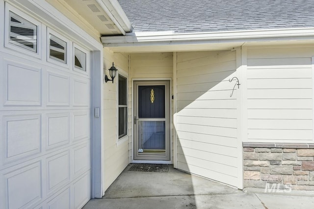 325 S Whisperwood Way, Boise, ID 83709 - entrance to property with a shingled roof