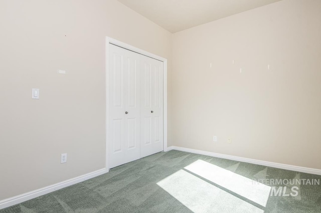 325 S Whisperwood Way, Boise, ID 83709 - unfurnished bedroom featuring baseboards, carpet, and a closet
