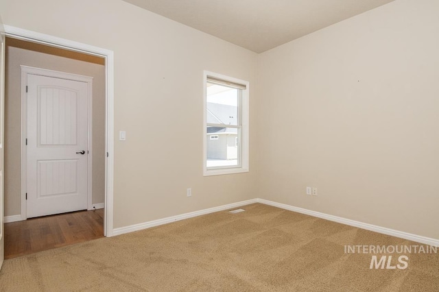 325 S Whisperwood Way, Boise, ID 83709 - unfurnished room with baseboards, carpet, and visible vents
