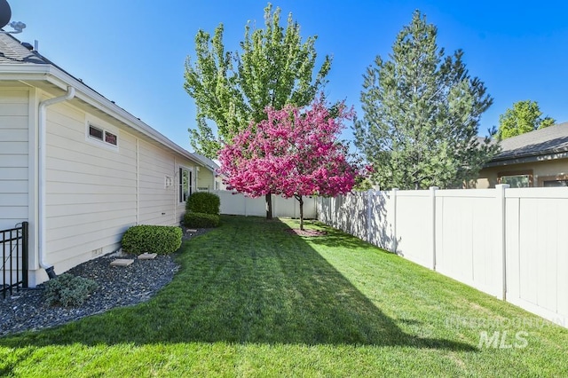 325 S Whisperwood Way, Boise, ID 83709 - view of yard with a fenced backyard