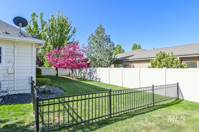 325 S Whisperwood Way, Boise, ID 83709 - view of yard featuring a fenced backyard