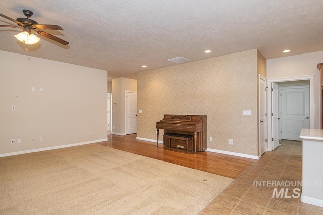 325 S Whisperwood Way, Boise, ID 83709 - unfurnished living room featuring recessed lighting, ceiling fan, visible vents, and baseboards