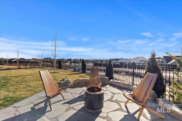 view of patio featuring an outdoor fire pit