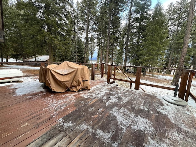 view of snow covered deck