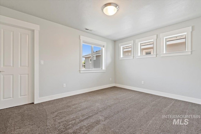 924 E Wright St, Boise, ID 83706 - carpeted spare room with baseboards