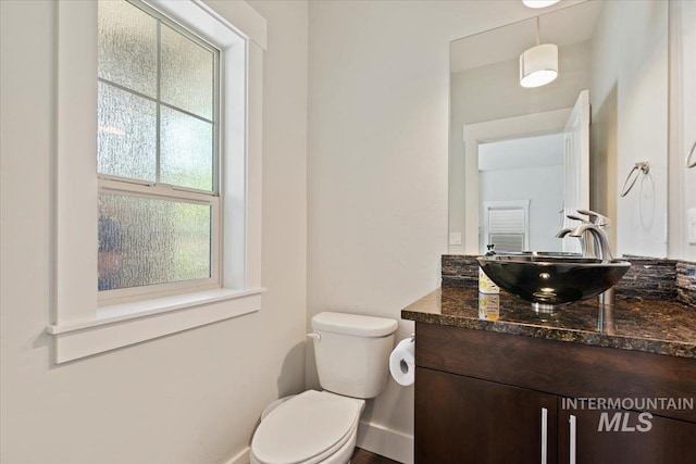 924 E Wright St, Boise, ID 83706 - bathroom featuring toilet and vanity