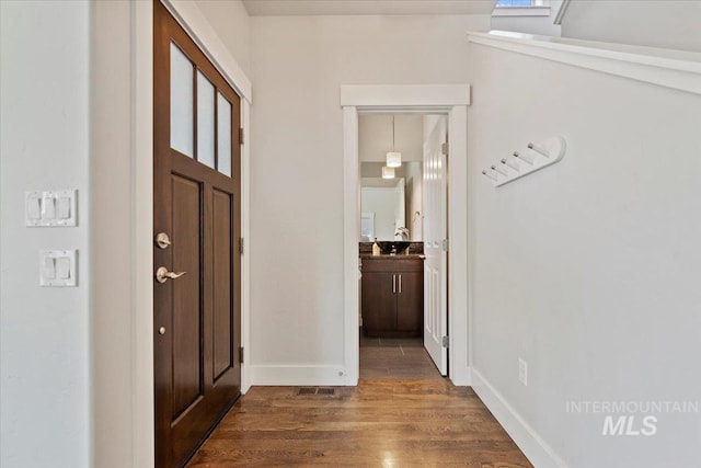 924 E Wright St, Boise, ID 83706 - entrance foyer featuring dark wood finished floors and baseboards
