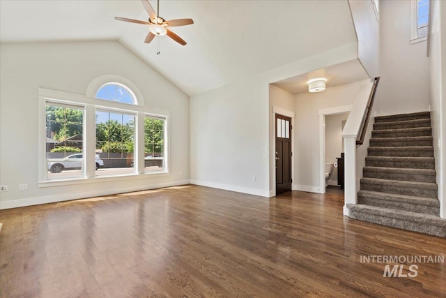 924 E Wright St, Boise, ID 83706 - unfurnished living room featuring ceiling fan, stairs, high vaulted ceiling, and wood finished floors