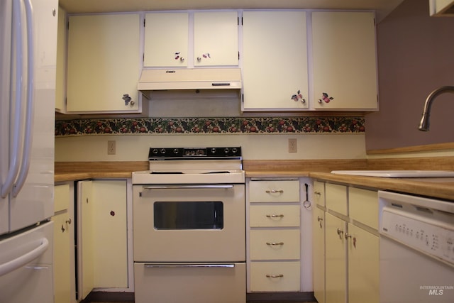 6244 Coach Royale Ln, Boise, ID 83704 - kitchen featuring white appliances, under cabinet range hood, a sink, light countertops, and white cabinets