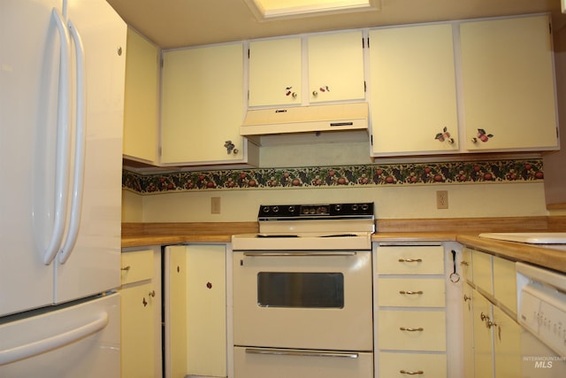 6244 Coach Royale Ln, Boise, ID 83704 - kitchen with white appliances, under cabinet range hood, and light countertops