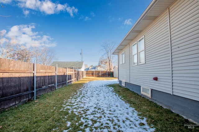 view of yard with a fenced backyard