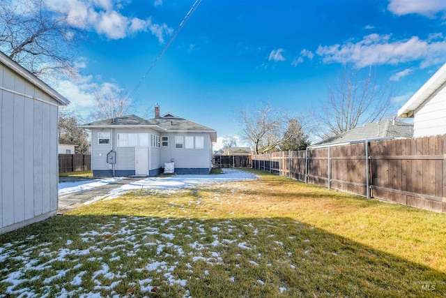 view of yard with a fenced backyard