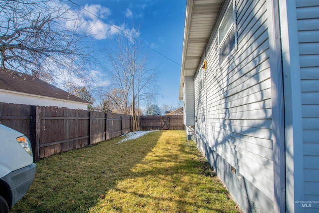 view of yard featuring a fenced backyard