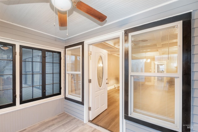 interior space featuring ceiling fan